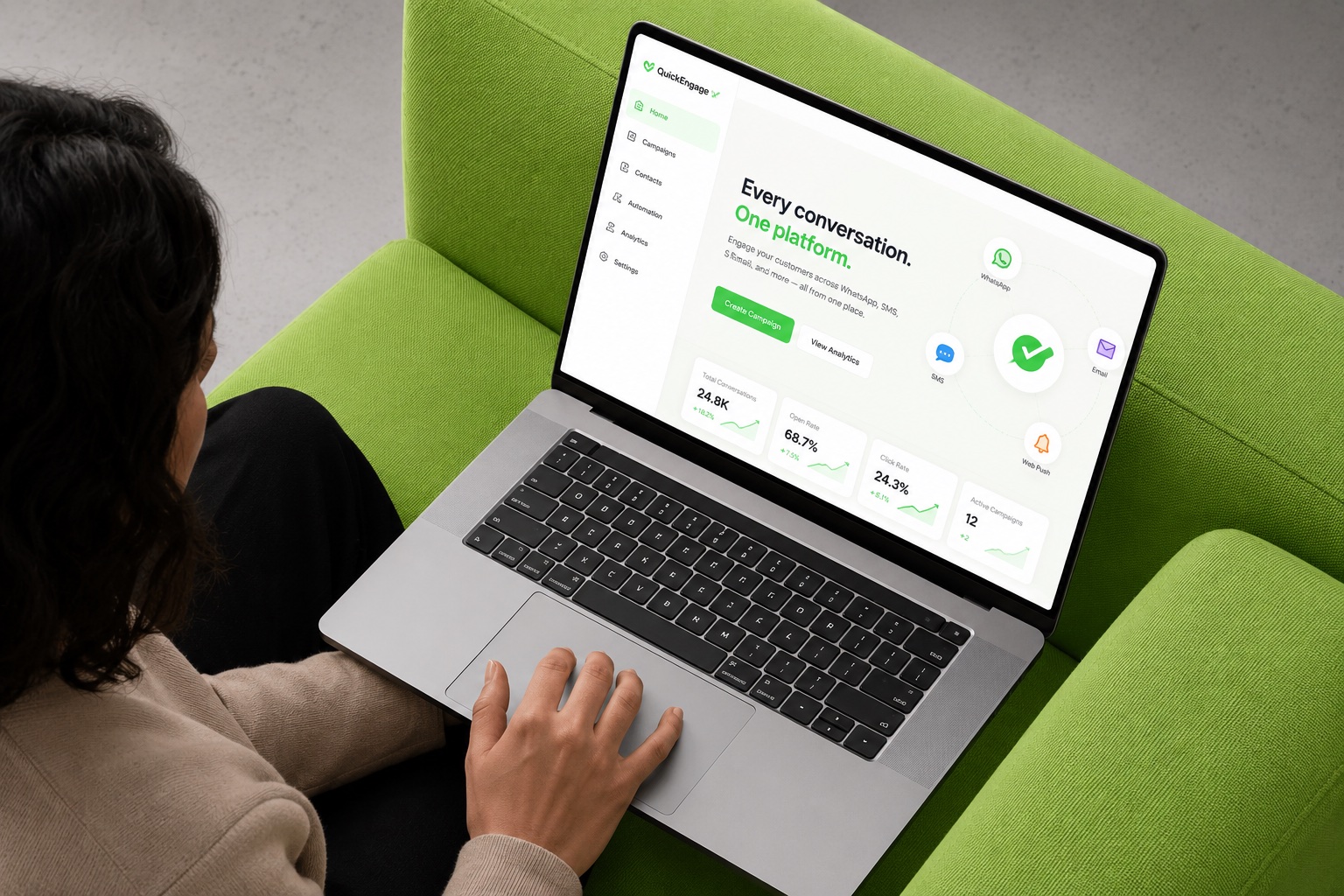 The OmniEngage dashboard shown on a laptop